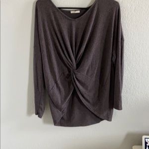 a dark grey long sleeve shirt